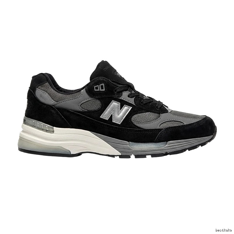 New Balance retro-style black and grey sports shoes