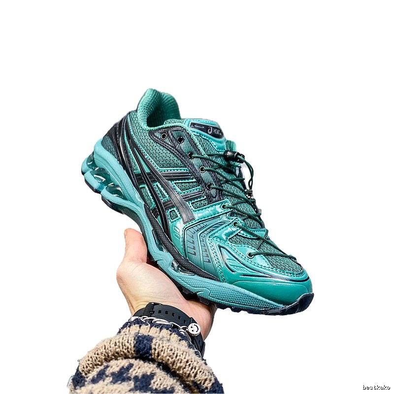 ASICS retro-style dark green sports shoes