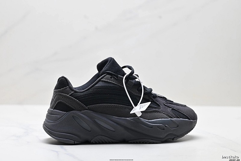 Retro-style black Yeezy 700 shoes