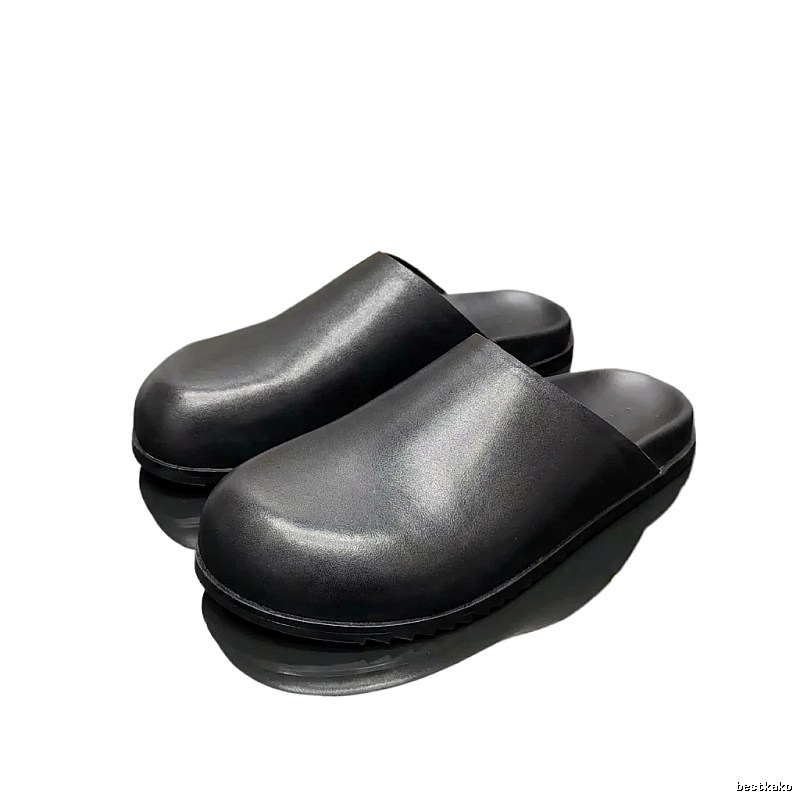 Rick Owens' dark style black slippers