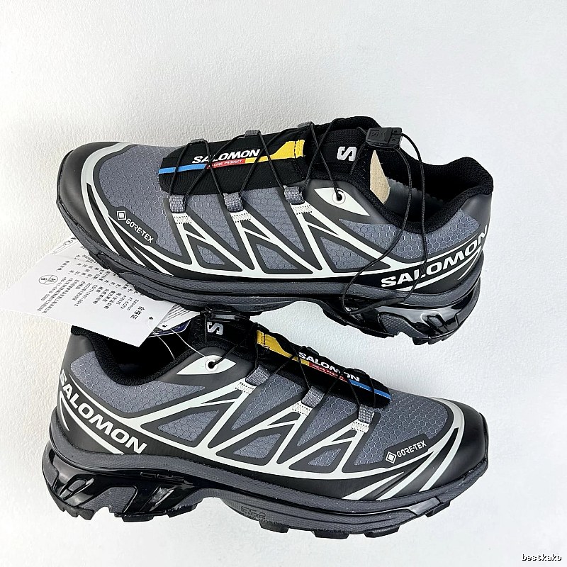 Salomon Black and Gray Trail Sneakers Defined by Treaded Trail Sole