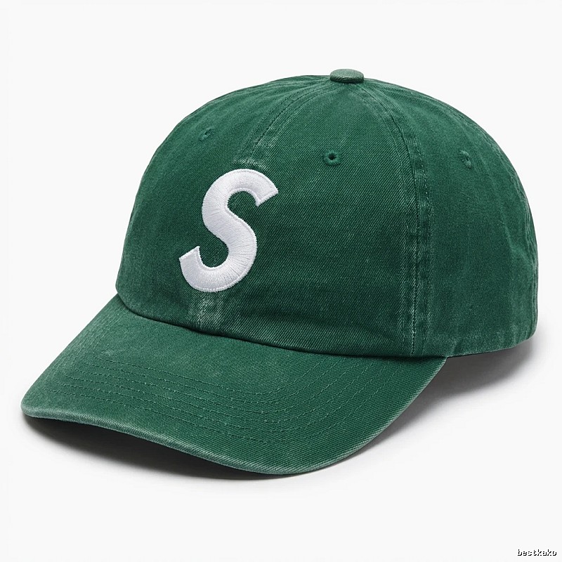 Vintage-style green hat with Supreme letters